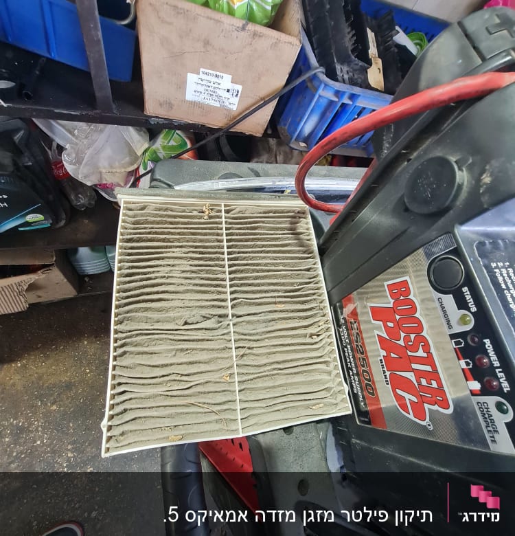 מסנן אוויר מלוכלך ומטען בוסטר לרכב